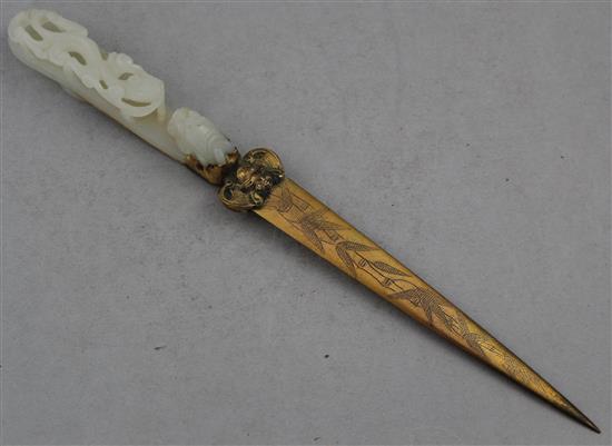 A Chinese white jade belt hook, 18th / 19th century, total length 22.5cm.